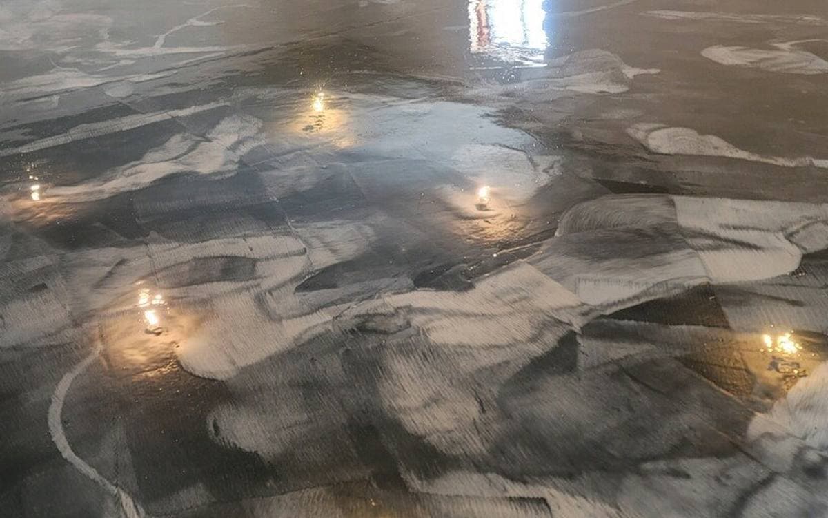 Metallic epoxy floor, poured by Top Grade